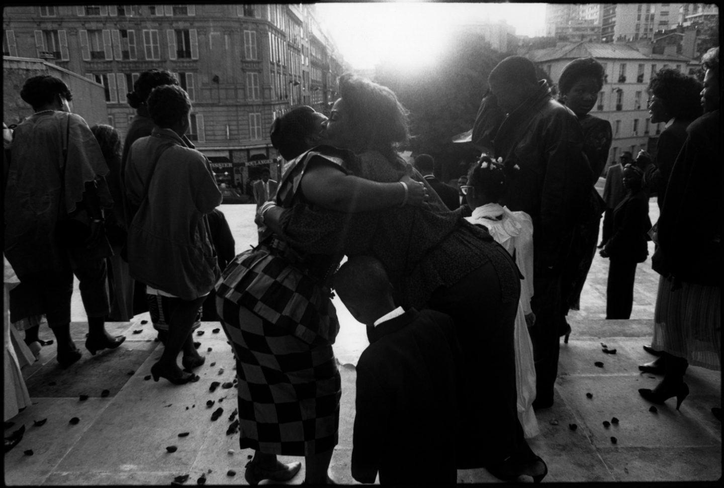 Sur les marches de l'église "Notre-Dame-de-la-Croix" de Ménilmontant. 1993. On the steps of the "Notre-Dame-de-la-Croix" church in Ménilmontant. 1993.